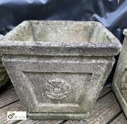 A reconstituted stone Planter, with rose motif, 14in high x 15in diameter