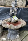 A reconstituted stone Bird Bath, with young Pan seated playing the pipes on a clam shell, 30in