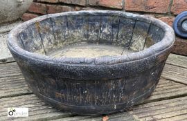 A reconstituted stone Planter, in the style of an old whisky barrel, 8in high x 22in diameter