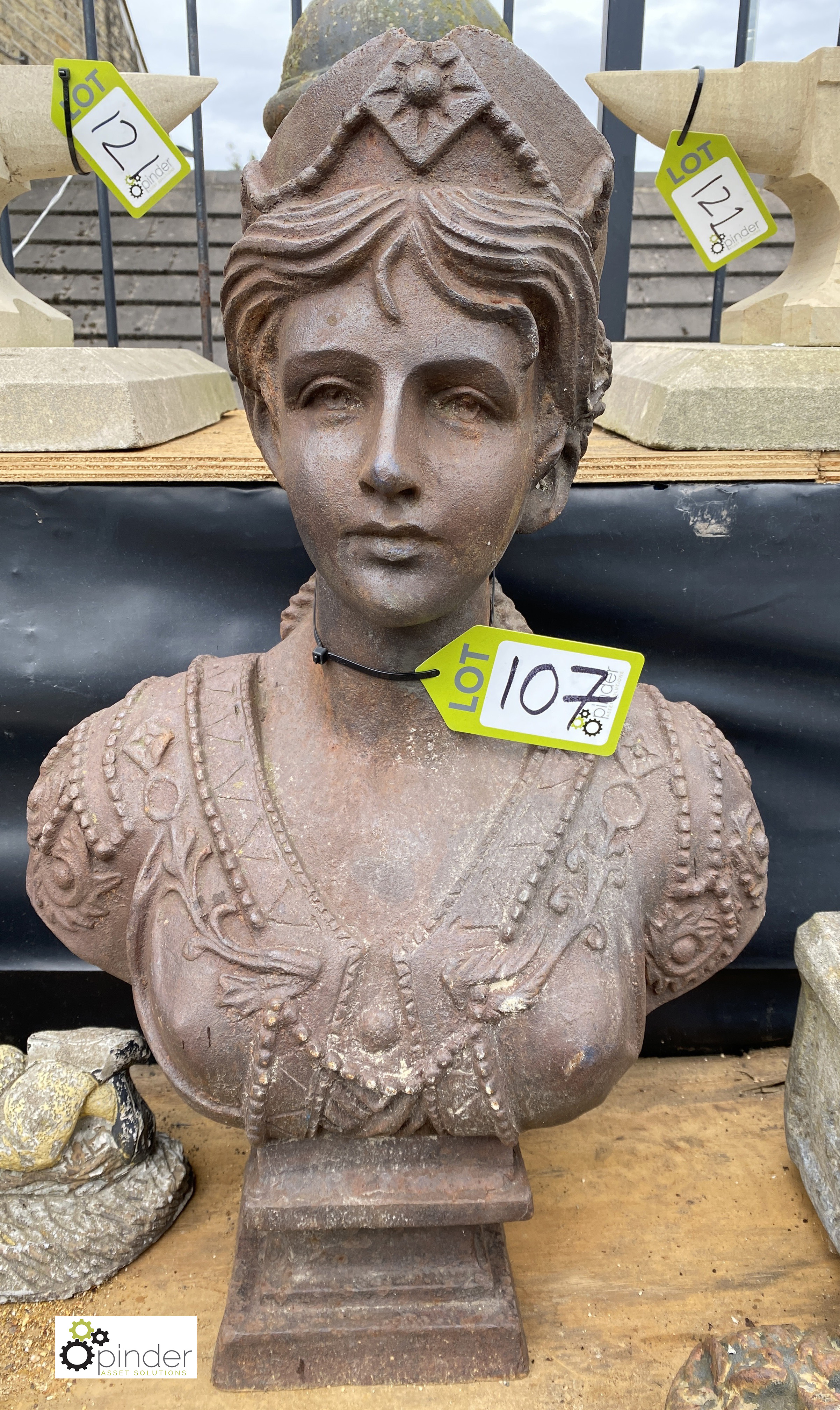 A decorative cast iron Bust of a Lady wearing a crown, 28in high