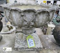 A reconstituted stone Urn, with acanthus leaf decoration, 16in high x 19in diameter