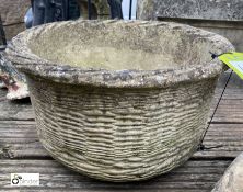 A reconstituted stone Wicker Work Planter, 16in diameter x 9in high