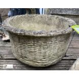 A reconstituted stone Wicker Work Planter, 16in diameter x 9in high