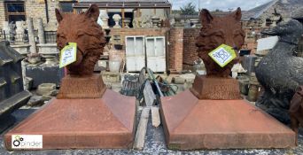 A pair cast iron Wolves Heads, on Edwardian salt glazed terracotta pier caps, 20in high x 17in x