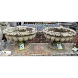A pair hand carved Yorkshire Gritstone Gadrooned Garden Urns, circa early to mid 1900s, 12in high