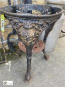 A decorative cast iron Pub Table Base, with girls face decoration, 26in high x 20in diameter