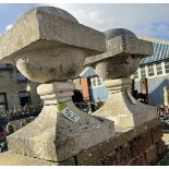 A pair carved Portland Stone Vanbrugh Balls on plinths, circa mid 1900s, 24in high plinth, 14in x