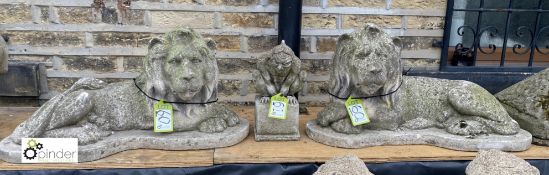 A pair reconstituted recumbent Statue of Lions, on plinths, 18in high x 34in wide