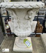 A reconstituted stone Urn, with Greek decoration, 22in high x 16in diameter