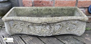 A rectangular reconstituted stone Window Planter, with fleur-de-lis decoration, 8in high x 12in wide