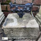 A Victorian cast iron Boot Scraper, on Yorkshire Stone base, 10in high, base 10in x 10in