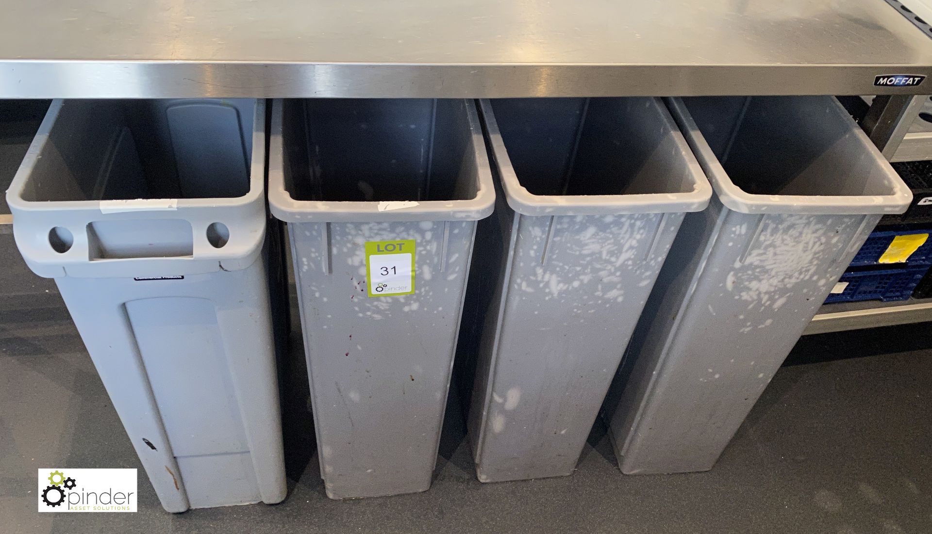 4 Rubbermaid Waste Bins