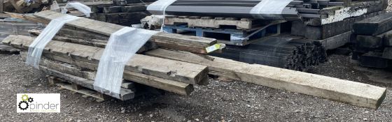 A quantity various reclaimed Timber