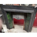 A cast iron Fireplace Insert, with green insert enamelled tiles, 970mm high x 970mm wide
