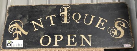 A painted Sign ‘Antiques Open’, on timber, 450mm high x 1090mm long