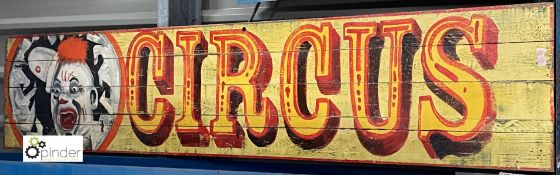 A Painting ‘Circus’ Sign with clown, on solid timber, 440mm high x 2100mm long