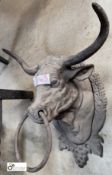 A cast iron wall mounted bulls head with horns Tethering Ring, 240mm high x 270mm wide