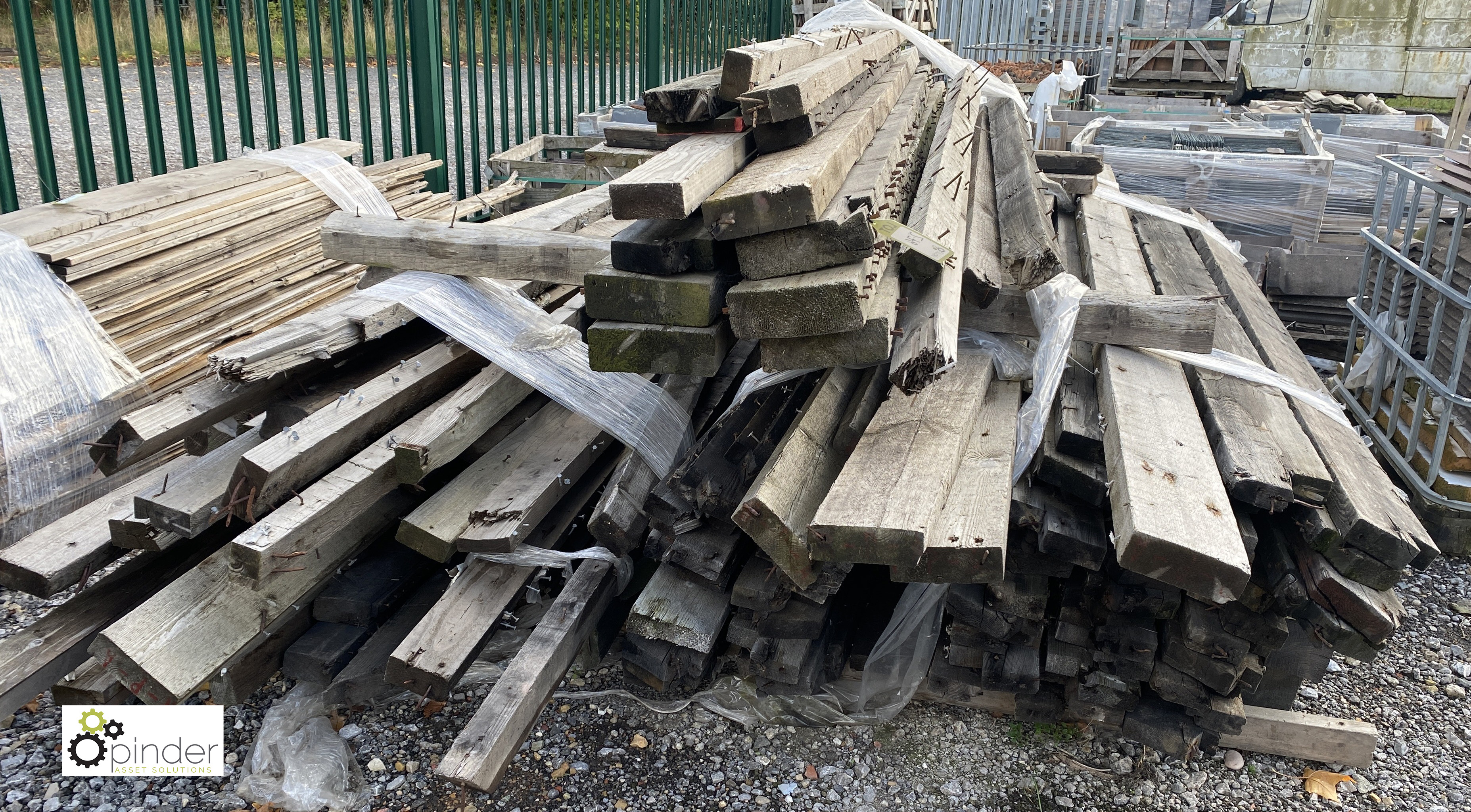 A quantity various reclaimed Timber