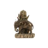 AN EARLY 20TH CENTURY VIENNESE PATINATED AND PAINTED ALABASTER LAMP DEPICTING A MAN WITH ELEPHANT IN
