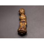 AN IMPORTANT GEM-SET GOLD GILT TIBETAN THRONE HANDLE, 18TH CENTURY