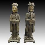 A PAIR OF BRONZE DIGNITARIES PARCEL GILT BUDDHAS, MING DYNASTY, 16TH CENTURY