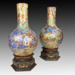 A MONUMENTAL PAIR OF CHINESE CLOBBERED VASES, 18TH CENTURY