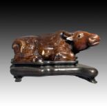 CHINESE GLAZED MONOCHROME BULL FIGURE ON BASE, 18TH CENTURY. QING PERIOD