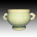 A CHINESE CELADON CENSOR, PROBABLY MING TO YUAN PERIOD