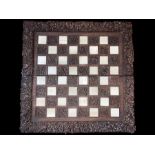 FINELY CARVED INDIAN ROSE WOOD & IVORY CHESS BOARD, 18TH CENTURY