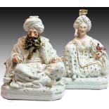 A PAIR OF PORCELAIN SEATED SULTAN AND SULTANA FIGURINES, JACOB PETIT, FRANCE, 19TH CENTURY