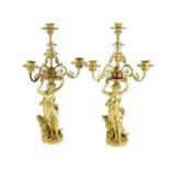 A pair of French ormolu four light candelabras, Napoleon III Period, Mid 19th Century