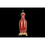 A LARGE ORIENTAL FLAMBE SANG DE BOEUF VASE CONVERTED TO LAMP, 19TH CENTURY