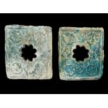 A PAIR OF RAQQA MOULDED MONOCHROME POTTERY TILES SYRIA, 12TH/ 13TH CENTURY