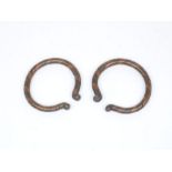 A pair of Roman bi-coloured copper and bronze bracelets 1st Century AD Or Later