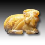 A MESOPOTAMIAN AMBER BULL CIRCA 1500 B.C.