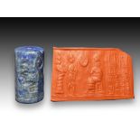 AN ARCADIAN LAPIS LAZULI CYLINDER SEAL WITH CUNEIFORM DEPICTING CEREMONIAL SCENES