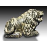 A Roman Granite Statuette Of A Reclining Lion 2nd-3rd Century A.D