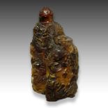 A CHINESE AMBER SNUFF BOTTLE, QING DYNASTY (1644-1911)