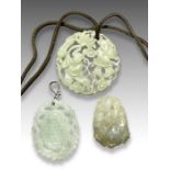 THREE JADE RETICULATED PENDANTS, QING DYNASTY (1644-1911)