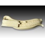 AN IVORY OKIMONO OF A BANANA, MEIJI PERIOD