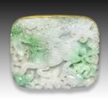 A CHINESE JADE BELT BUCKLE DEPICTING A DRAGON IN THE CLOUD, QING DYNASTY (6144-1911)