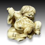 AN IVORY NETSUKE OF A GAMA SENNIN, MEIJI PERIOD