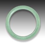 A PALE JADE CELADON BANGLE, QING DYNASTY (1644-1911)