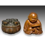 TWO WOOD NETSUKE OF A WOVEN BASKET & A OKAME (LADY) MEIJI PERIOD