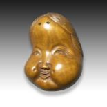 MASANAO A WOOD NETSUKE OKAME, ISE PROVINCE, MEIJI PERIOD