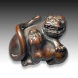 A WOOD NETSUKE OF A TIGER & A CUB, MEIJI PERIOD