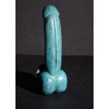 A TURQUOISE COLOURED STONE PHALLUS, EGYPTIAN OR LATER