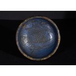 A FAIENCE BOWL WITH FISH & LOTUSES EGYPTIAN NEW KINGDOM,18TH DYNASTY, 1550-1295 B.C.