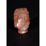 A GREEK QUARTZ BUST OF SERAPIS