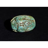 AN EGYPTIAN FAIENCE SCARAB AMULET MIDDLE KINGDOM/LATE PERIOD CIRCA 1980-530 B.C.